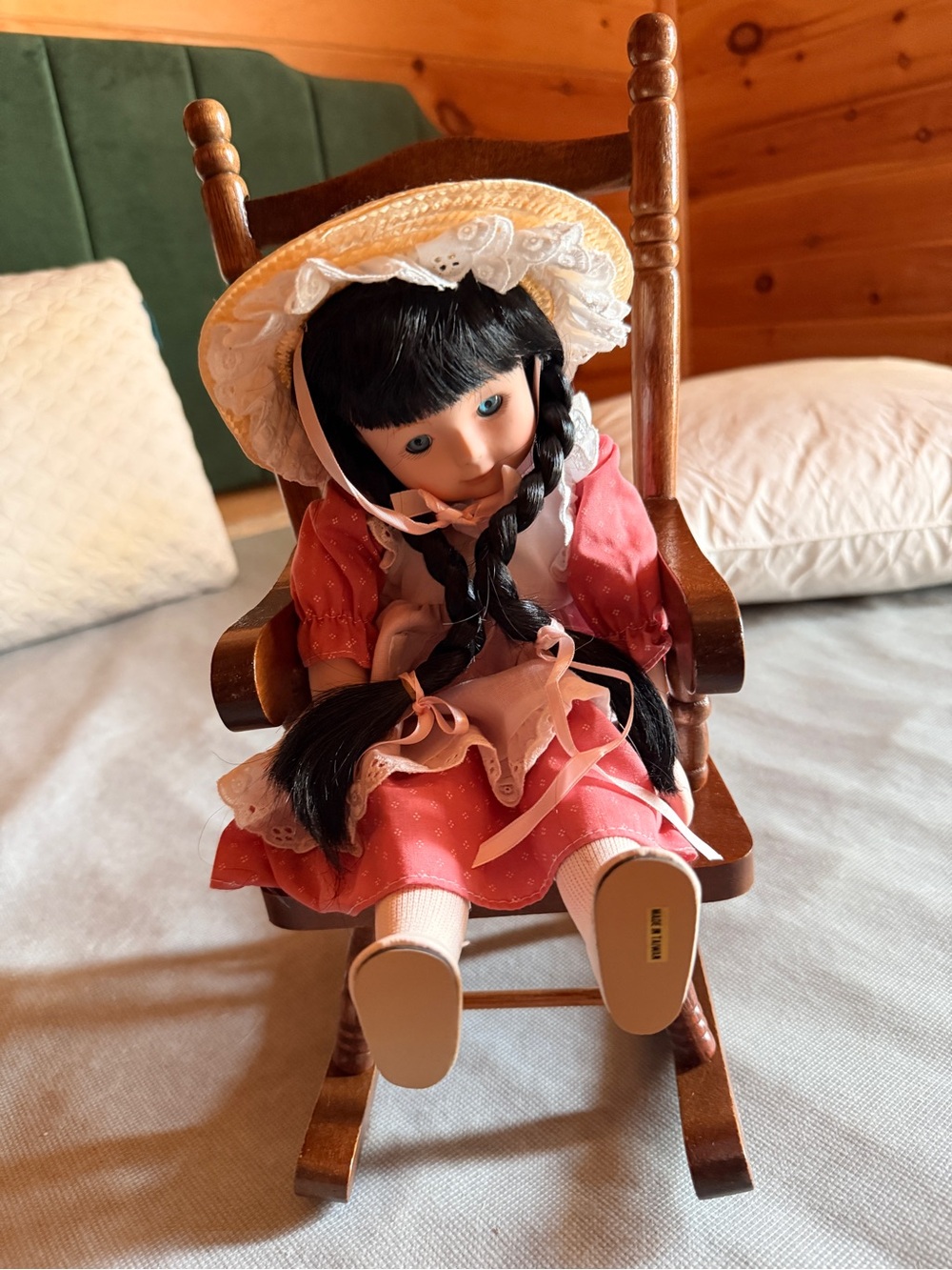Classic Pink Dress Porcelain Doll with Bonnet and Wooden Rocking Chair
